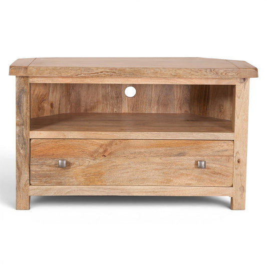 Pieces For Places Olda natural mango wood corner TV unit with open shelf and one drawer with steel knobs.