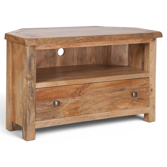 Pieces For Places Olda mango wood corner TV unit with open shelf and drawer. Natural finish with visible wood grain.