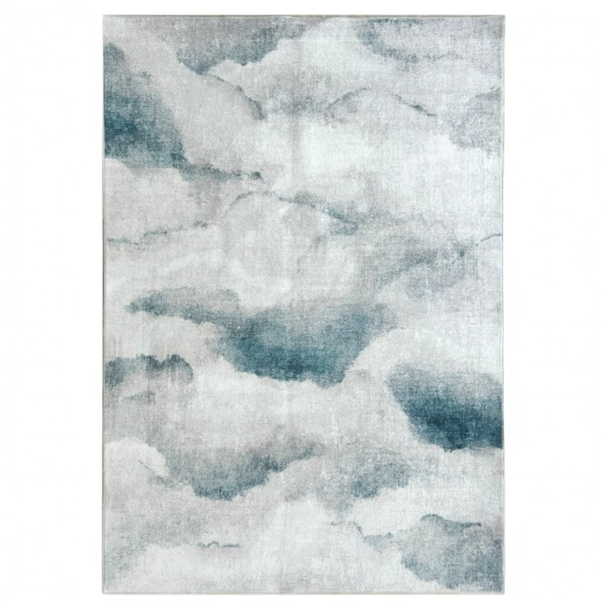 Pieces For Places Blue Cloudburst washable rug with an abstract layered cloud design in blue, grey, and neutral tones.