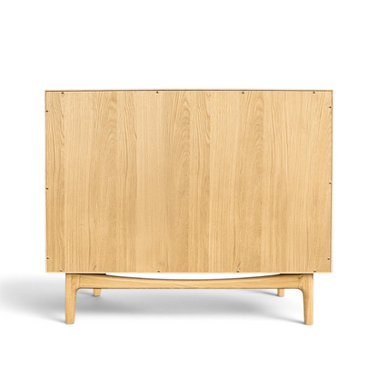 Pieces For Places Larsen 3 drawer chest back view featuring light oak wood grain and tapered wooden legs