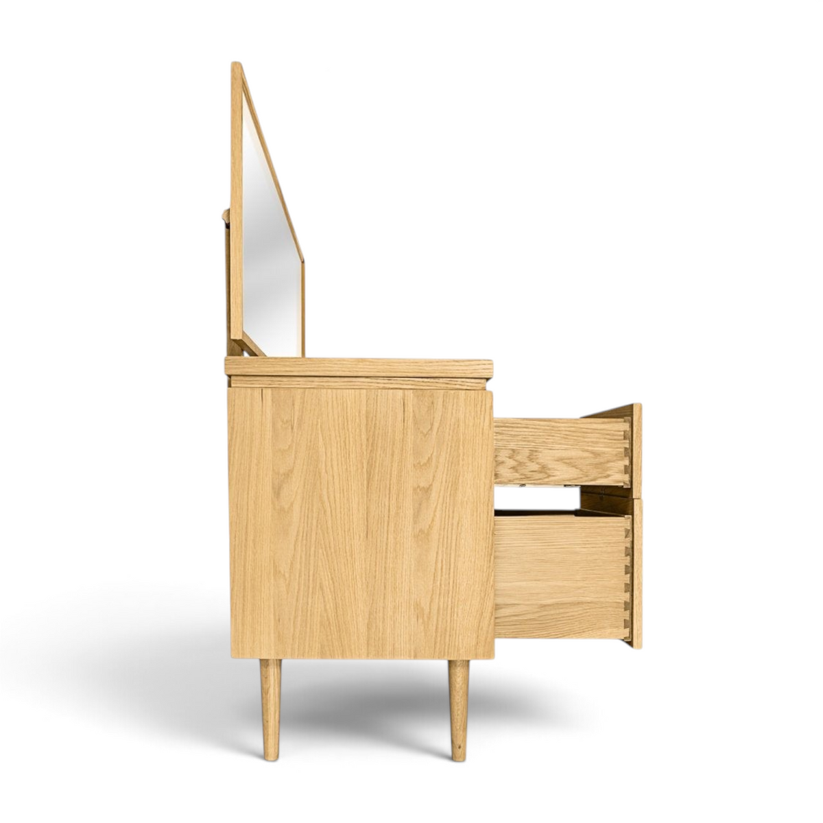 Pieces For Places Larsen dressing table in light oak wood with tapered legs and open drawers, side profile view.