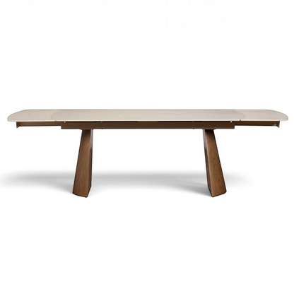 Pieces For Places extending dining table with a sintered stone top and ash-veneered legs in a contemporary style