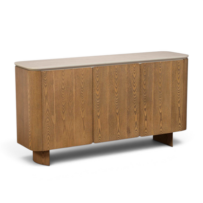 Pieces For Places Lusso wide 3-door sideboard with a light sintered stone top and natural ash veneered wood frame.