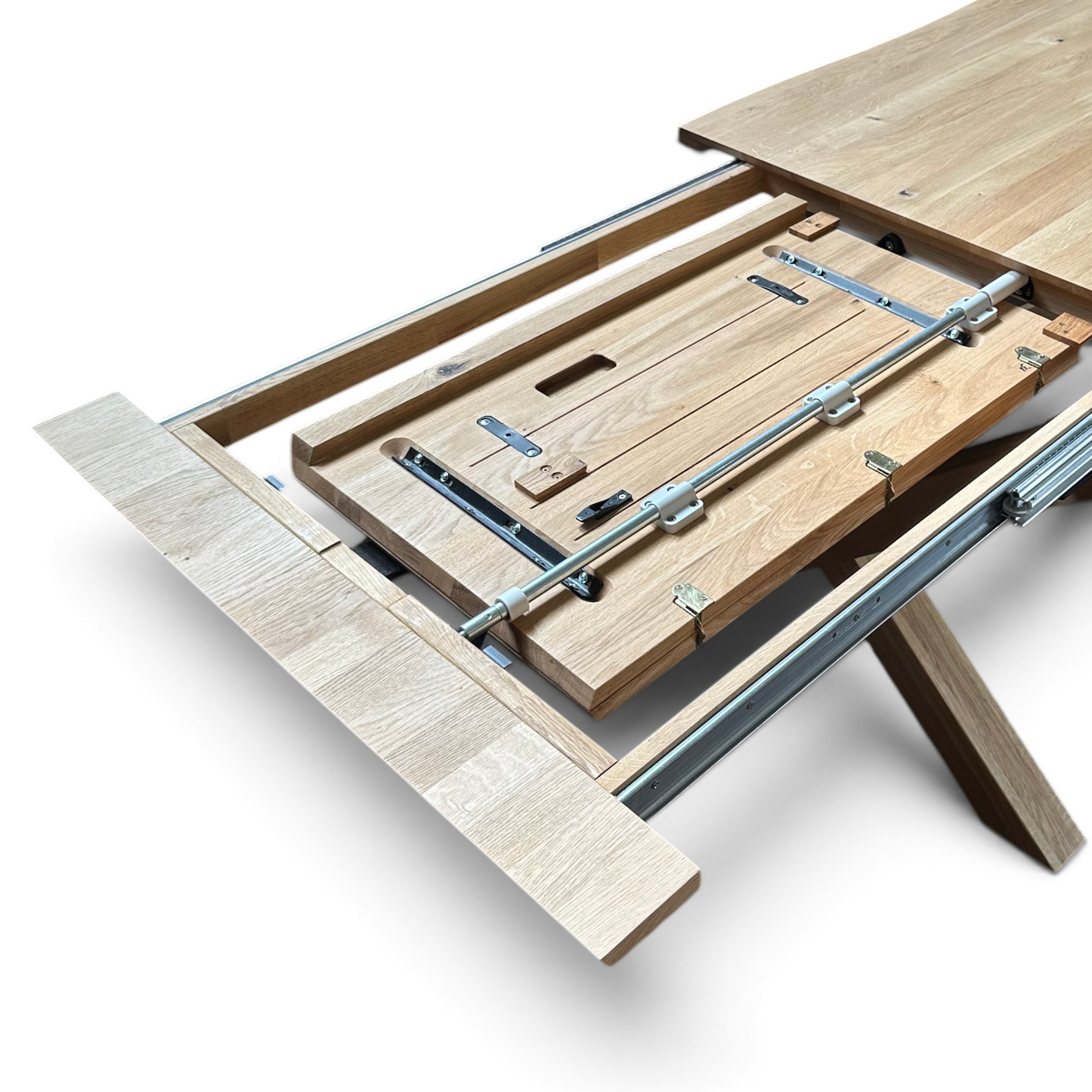 Pieces For Places oiled oak extending dining table with natural live edge and internal storage mechanism