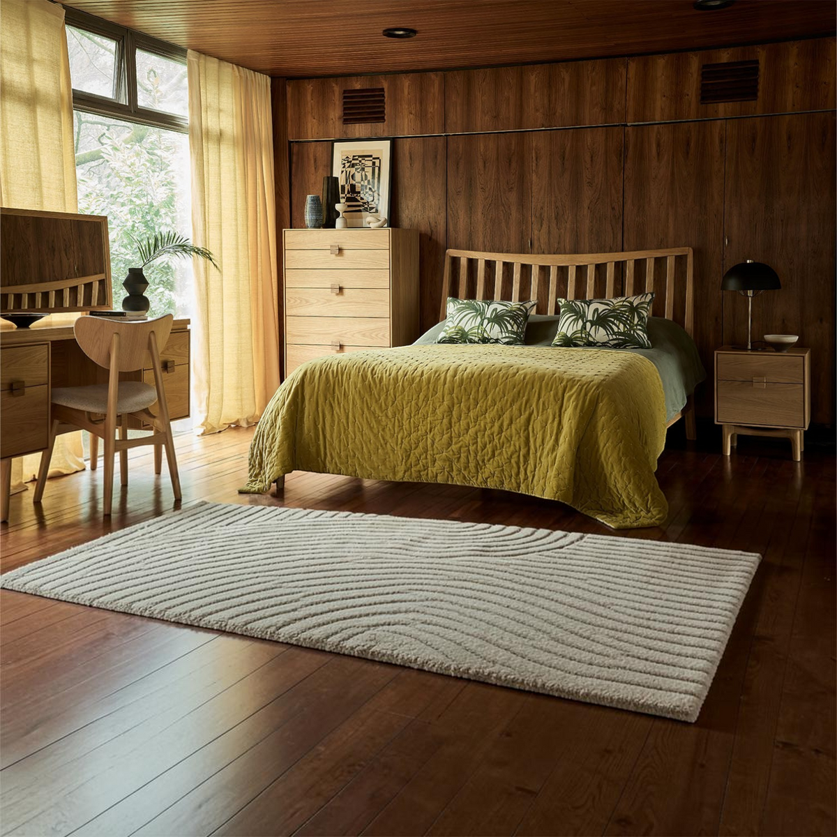 Pieces For Places Larsen oak bed frame with slatted headboard in a mid-century modern bedroom with matching furniture.