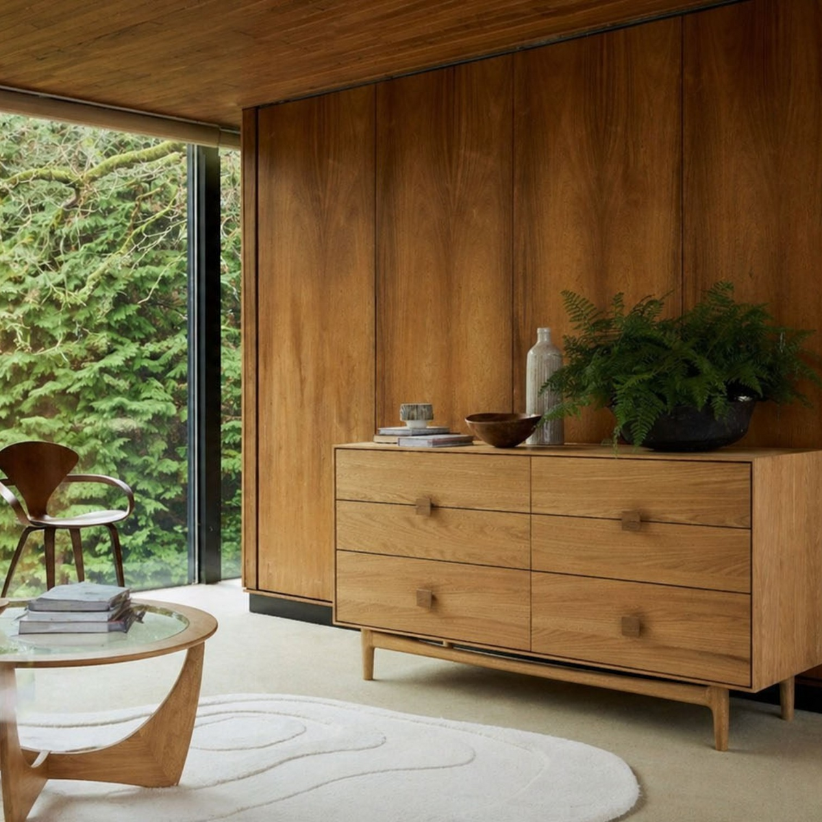 Pieces For Places Larsen 6 drawer wide chest in light oak wood with minimalist square handles in a modern living room.