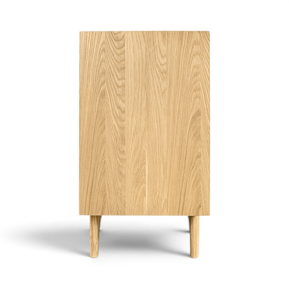 Pieces For Places Larsen 6 drawer wide chest in light oak wood with a minimalist Danish design and tapered legs