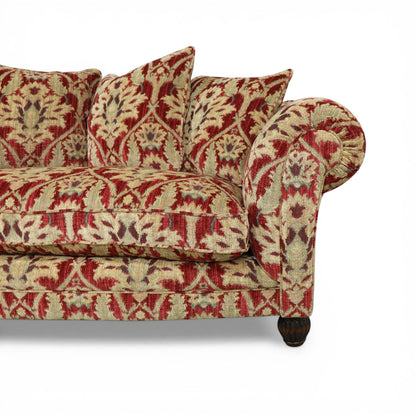 Pieces For Places Elgar Grand Sofa in Enigma Claret fabric with scroll arms, scatter cushions, and hardwood feet.