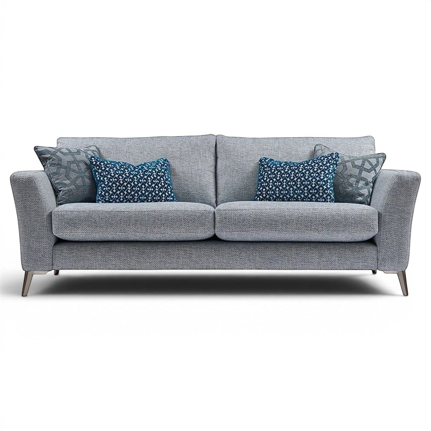 Pieces For Places Florence 3 Seater Sofa in grey fabric with reversible seat cushions and decorative blue scatter cushions.
