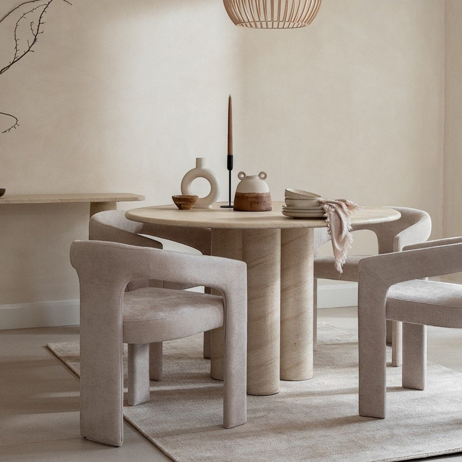 Pieces For Places Georgia light beige upholstered dining chair with fully fabric-covered legs in a modern dining room.