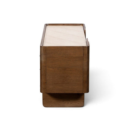 Pieces For Places Ida media unit side view showing walnut finish oak frame and travertine effect concrete top