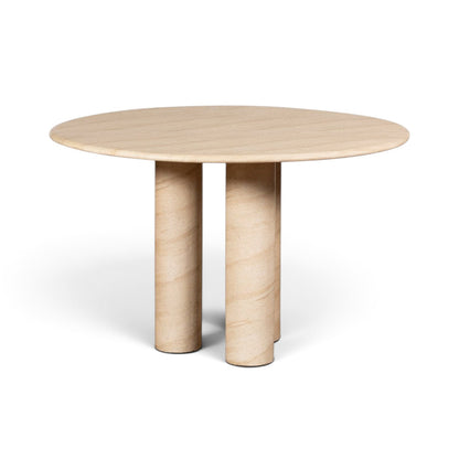Pieces For Places Ida 120cm round dining table with a beige travertine finish and unique column leg design.