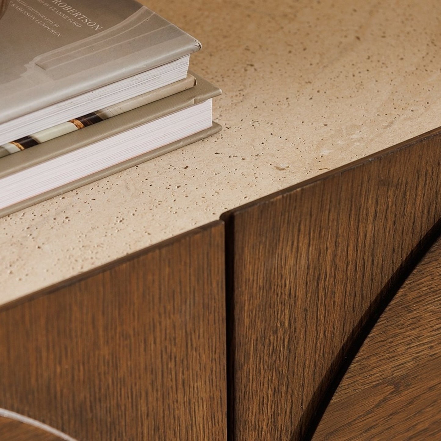 Pieces For Places Ida sideboard featuring a textured travertine finish stone top and solid oak wood cabinet doors.