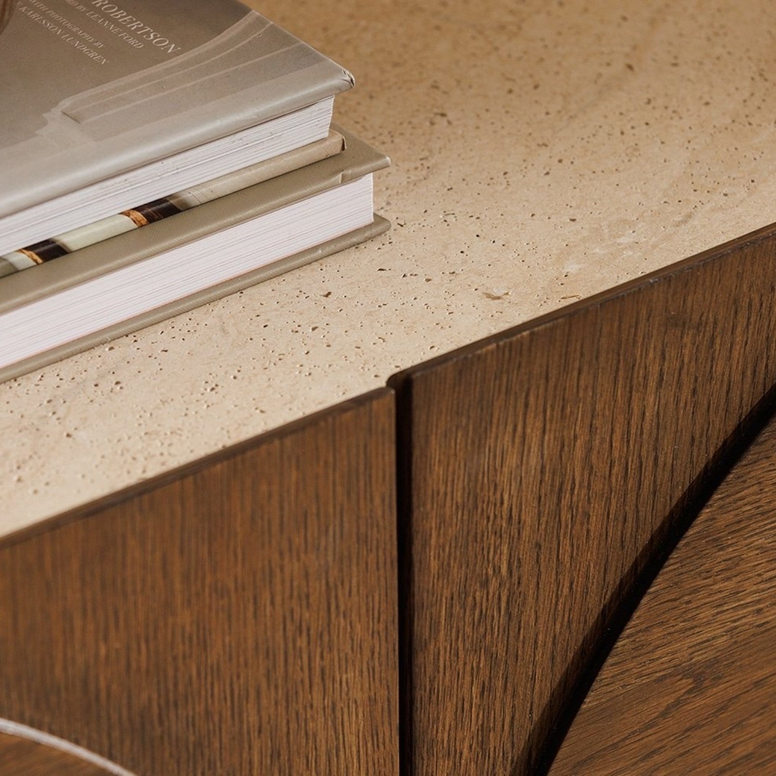 Pieces For Places Ida sideboard featuring a textured travertine finish stone top and solid oak wood cabinet doors.