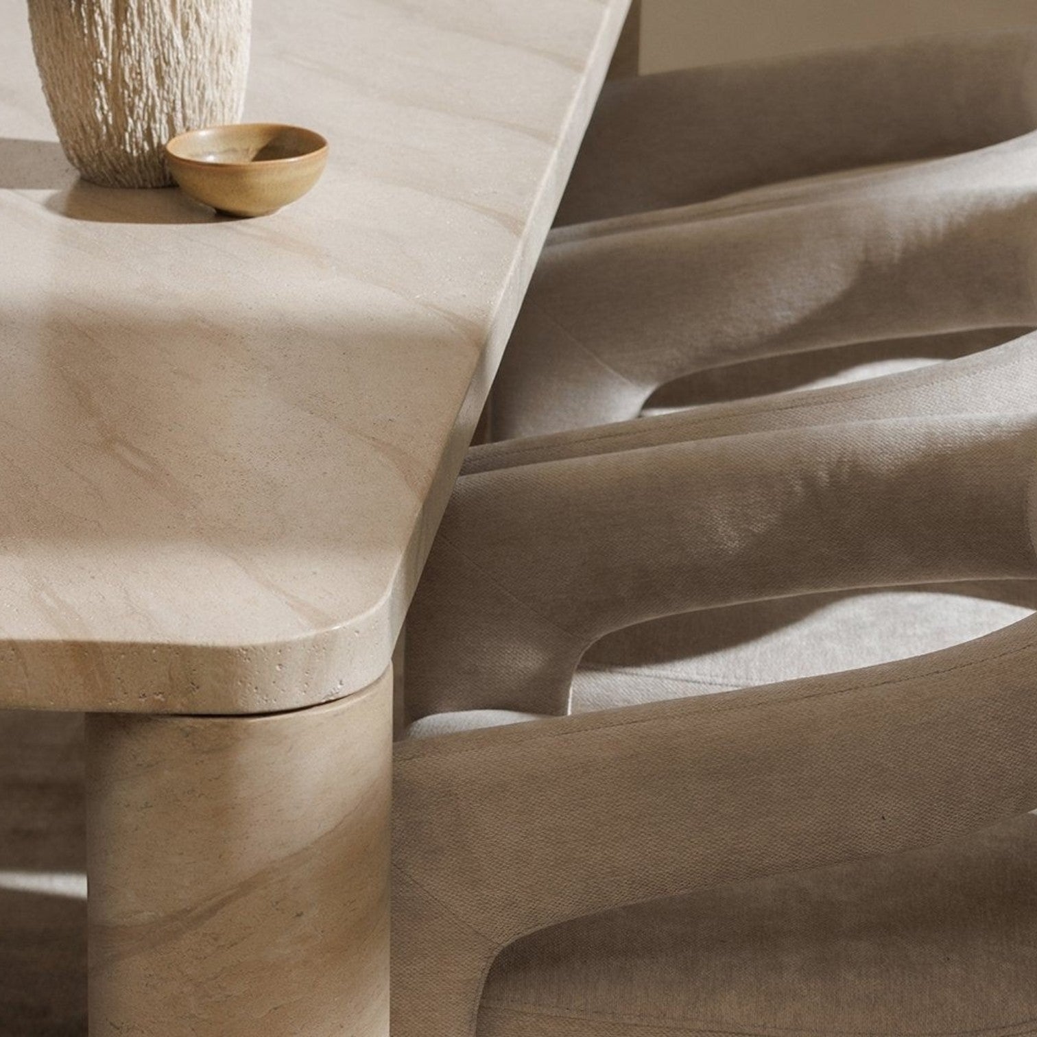 Pieces For Places Ida 150cm rectangular dining table with travertine finish and matching curved dining chairs