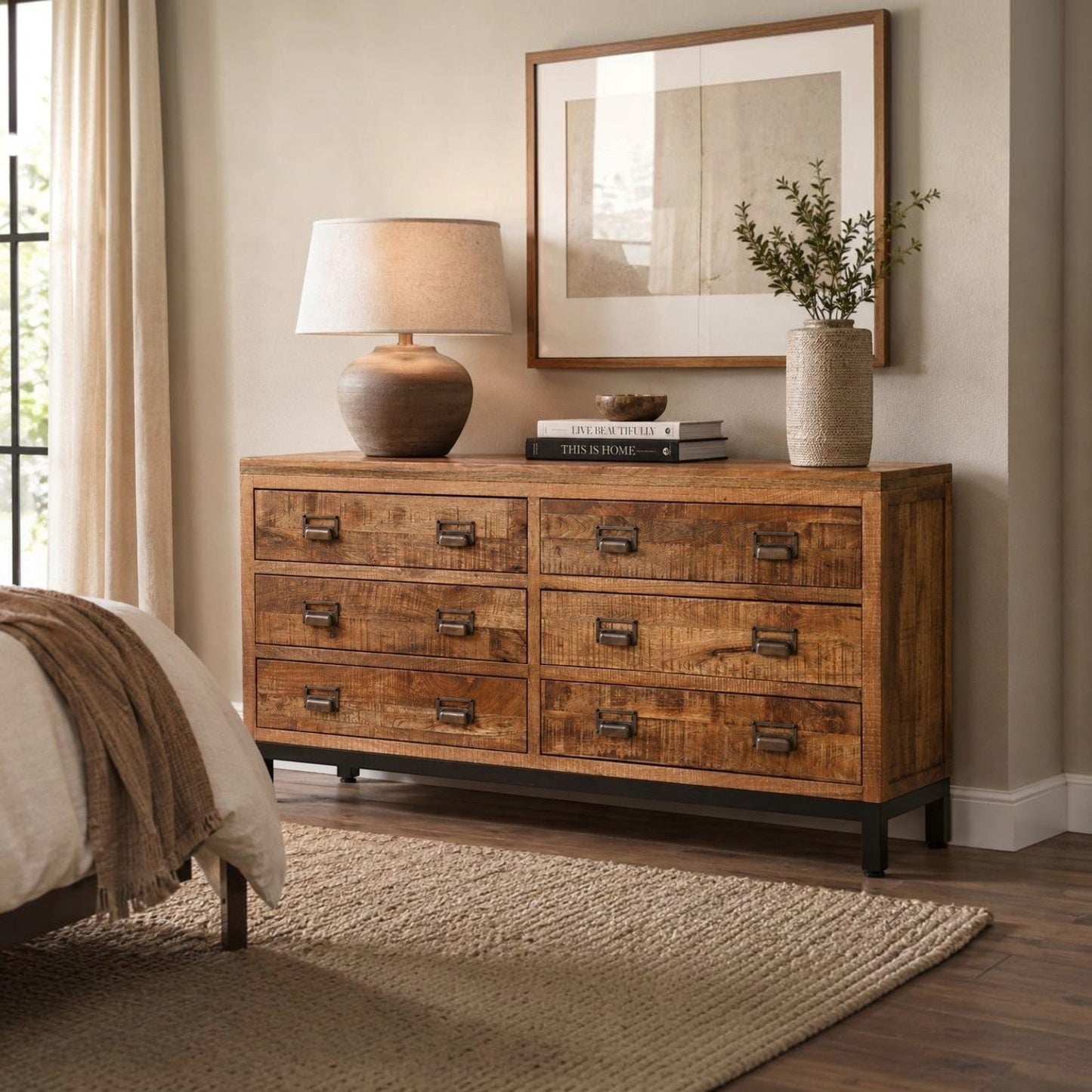 Pieces For Places industrial 6-drawer apothecary chest in solid mango wood with black metal frame and handles.