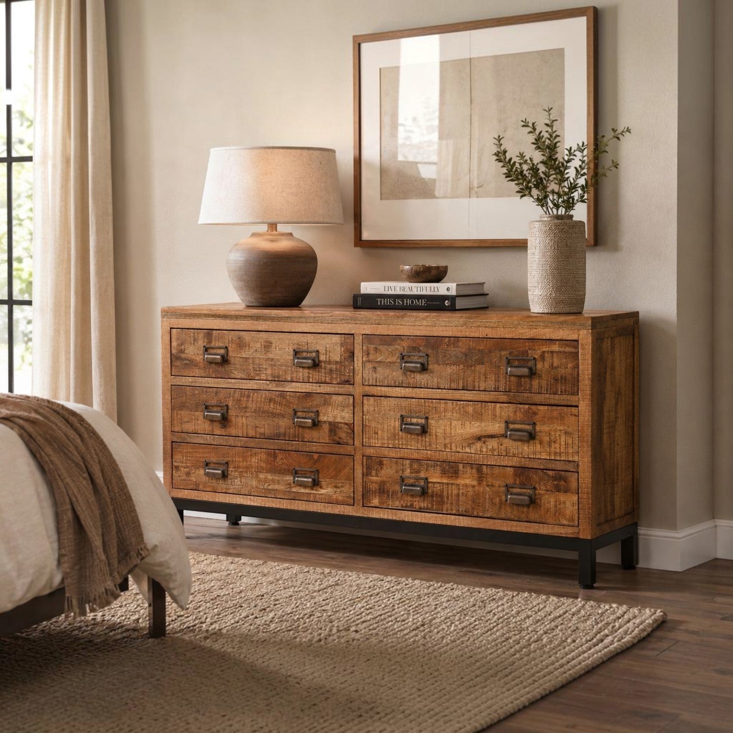 Pieces For Places industrial 6-drawer apothecary chest in solid mango wood with black metal frame and handles.