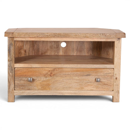 Pieces For Places Olda natural mango wood corner TV unit with open shelf and one drawer with steel knobs.