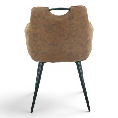 Pieces For Places Monza brown vegan leather dining chair with black steel legs and a metal handle detail on the back.