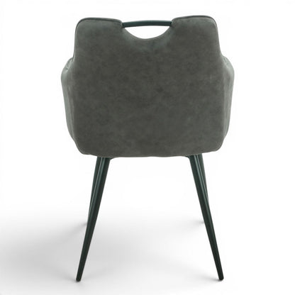 Pieces For Places Monza grey vegan leather dining chair with metal handle and black steel legs.