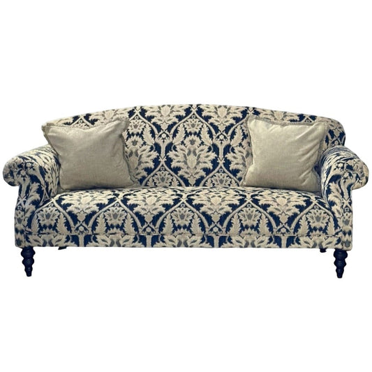 Pieces For Places Tallis Midi Sofa in navy and cream damask chenille fabric with two neutral cushions and dark wood legs.