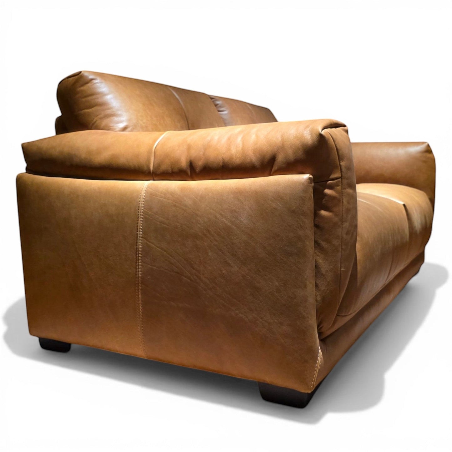Pieces For Places Theo tan leather 2-seater sofa with high-resilience foam seat and Dacron fibre back cushions.