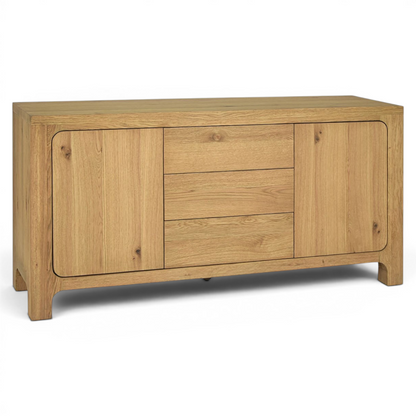 Pieces For Places Wyatt wide sideboard in reclaimed oak veneer with two cabinet doors and three central drawers.