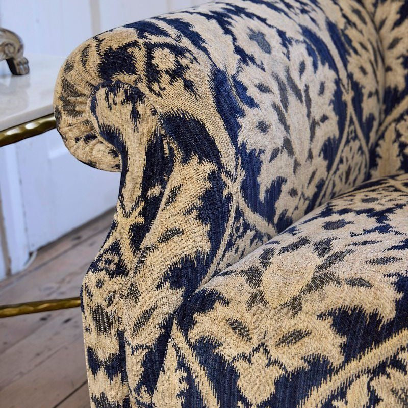 Pieces For Places Tallis Grand Sofa in indigo blue and natural ikat chenille fabric with rolled arms.