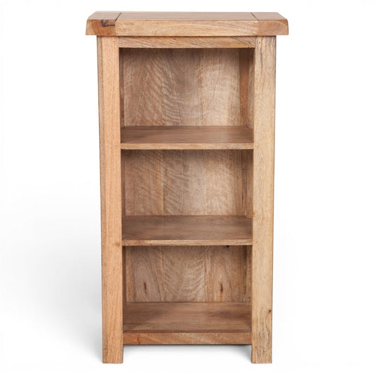 Pieces For Places Olda natural mango wood DVD rack with three open shelves and rounded top corners.