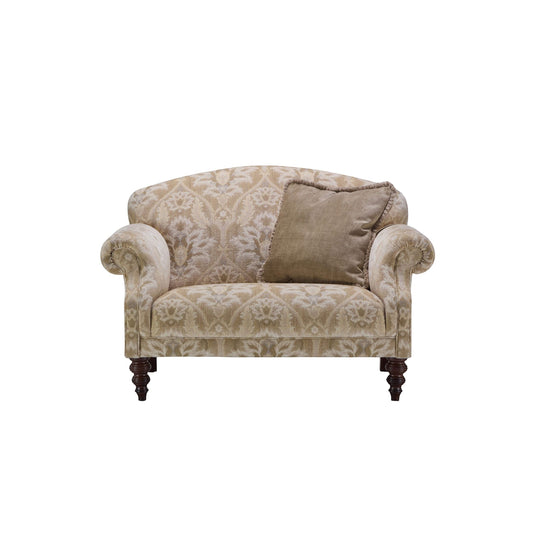 Pieces For Places Tallis Snuggler, Victorian-style high-back chesterfield sofa in natural chenille fabric with damask pattern and decorative cushion.