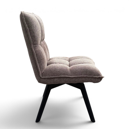 Pieces For Places Bubble light beige grey upholstered swivel dining chair with a tufted seat and black metal legs